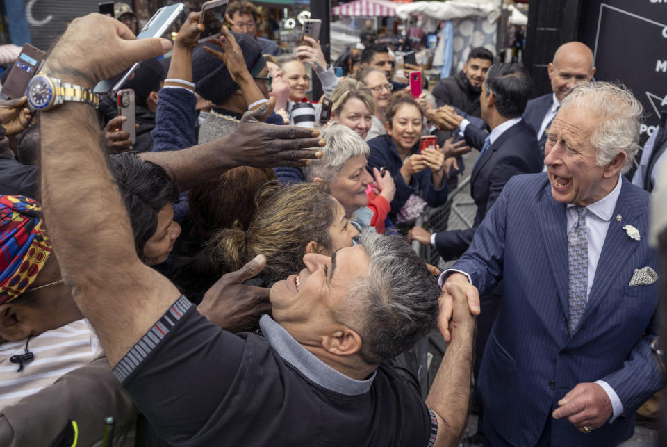 FILE - Britain's Prince Charles meets the public in Walworth, London, Wednesday, May 11, 2022 during a visit to a JD Sports store to meet with young people supported by The Prince's Trust through the UK Government's Kickstart Scheme. (Paul Grover/Pool Photo via AP, File)