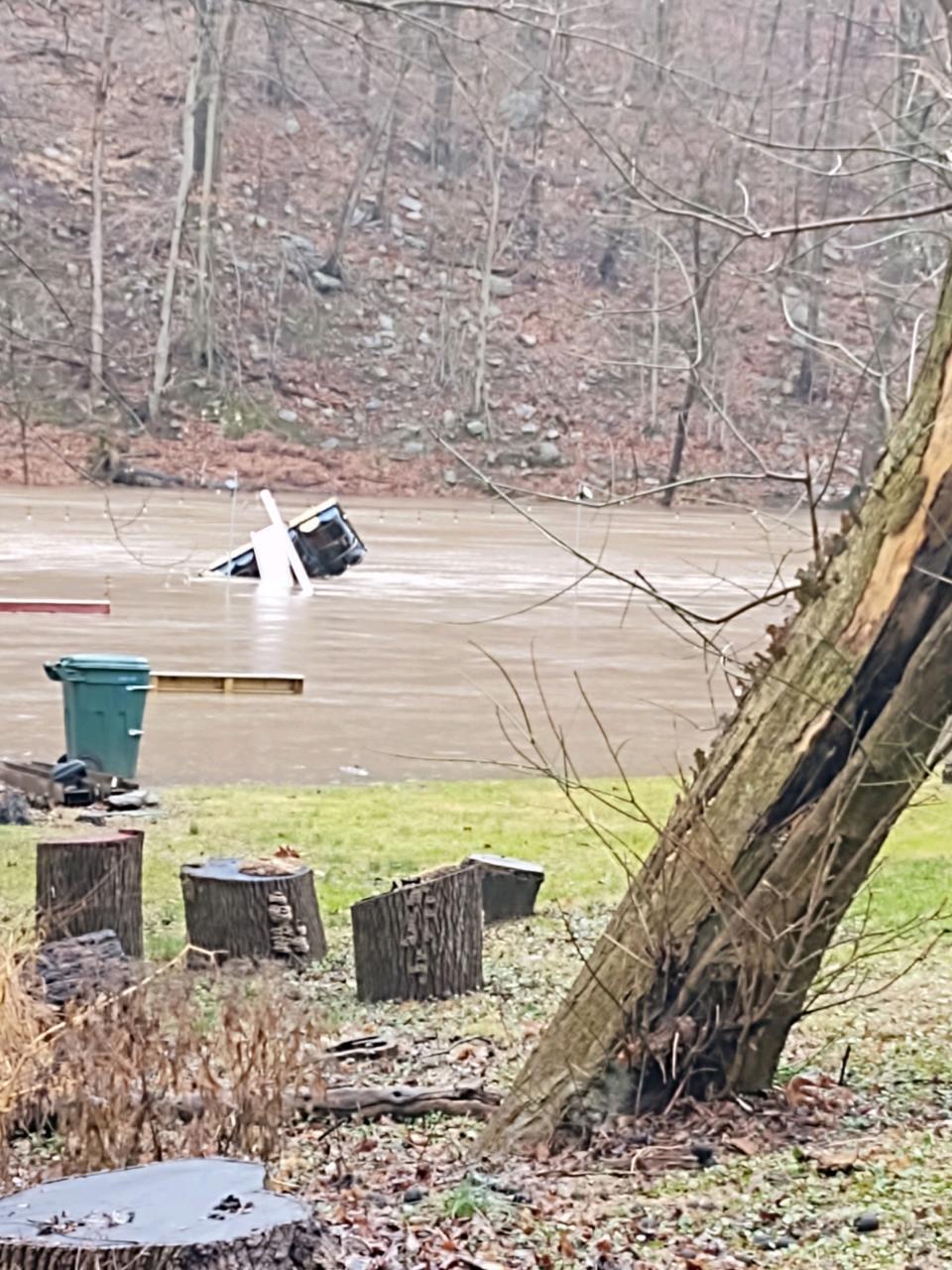 The Neshaminy Creek spills it banks near Periwinkle Park in Middletown and impacts parts of Neshaminy Woods in Lower Southampton. Some streets in the community were under water Monday afternoon.