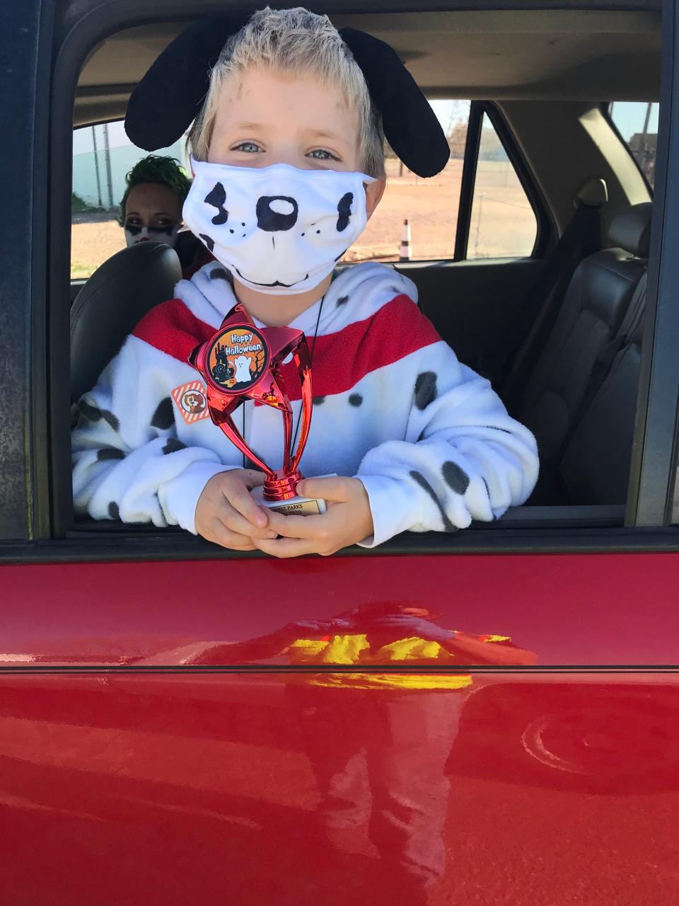 Children dressed up in costumes received their treats while staying in their cars. Parks and Rec workers wore masks to help prevent the spread of COVID-19 during the annual Halloween Bash in 2020.