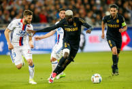 Football Soccer - Olympique Lyon v Monaco - French Ligue 1 - Stade de Lyon – Decines, France - 23/4/2017 Olympique Lyon's Lucas Tousart (L) in action against Monaco's Tiemoue Bakayoko (C) REUTERS/Robert Pratta