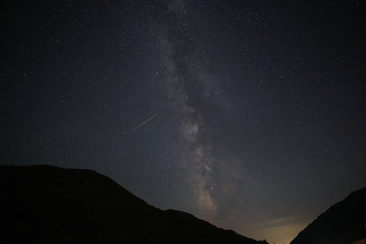 A view of meteor streaks in the night sky during annual Perseid meteor shower at Shebenik National Park, in Fushe Stude, Albania, 13 August 2023 (REUTERS)