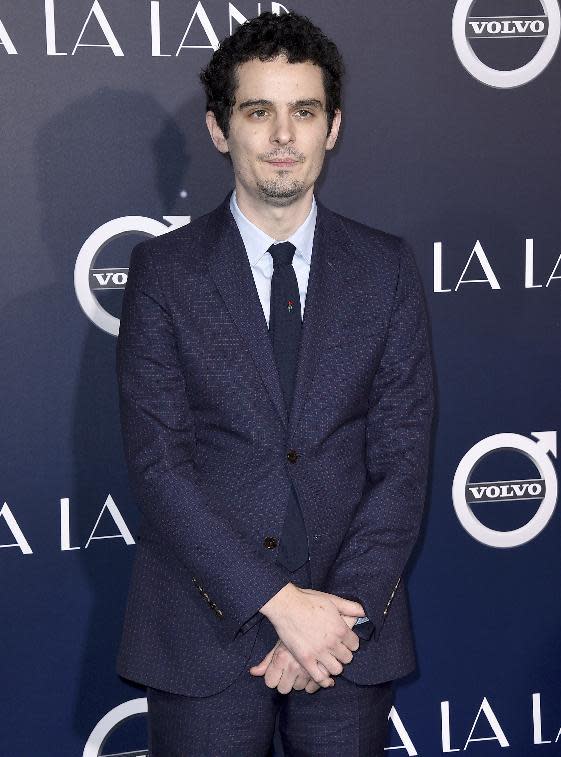 FILE - This Dec. 6, 2016 file photo shows director Damien Chazelle at the premiere of "La La Land" in Los Angeles. At the center of this year's Oscars are two filmmakers in their 30s with seemingly limitless careers ahead of them. Barry Jenkins, the 37-year-old director of "Moonlight," and Chazelle, the 32-year-old maker of "La La Land." Both films have 22 nominations between them. (Photo by Jordan Strauss/Invision/AP, File)