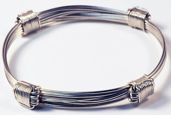 4 knot sterling silver bracelet in elephant hair style