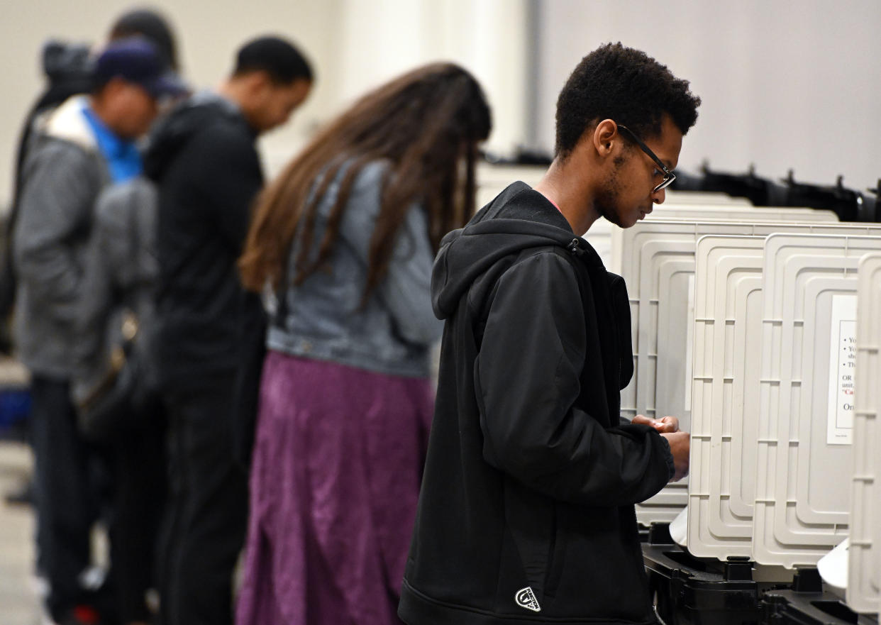 People cast their ballots on Oct. 27, 2018, in Marietta, Ga., ahead of the Nov. 6 midterm election. (Photo: Mike Stewart/AP)