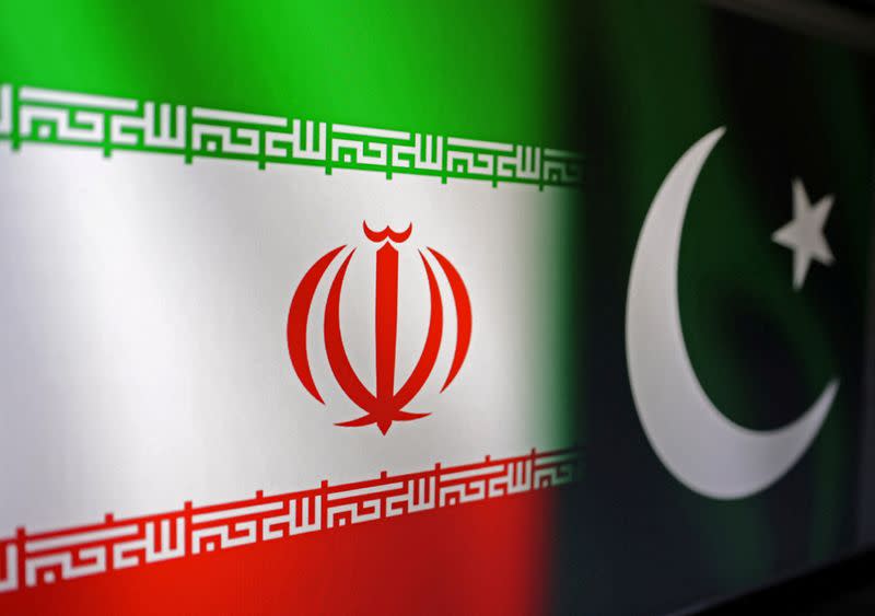 Illustration shows Iranian and Pakistani flags