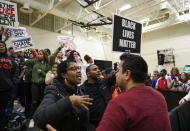 ST LOUIS PARK, MN - MARCH 01: Protestors on stage during a rally for Democratic presidential candidate Sen. Amy Klobuchar (D-MN) on March 1, 2020 in St Louis Park, Minnesota. The protesters, critical of Klobuchar's history as a prosecutor in Hennepin County, successfully shut down the event. (Photo by Stephen Maturen/Getty Images)