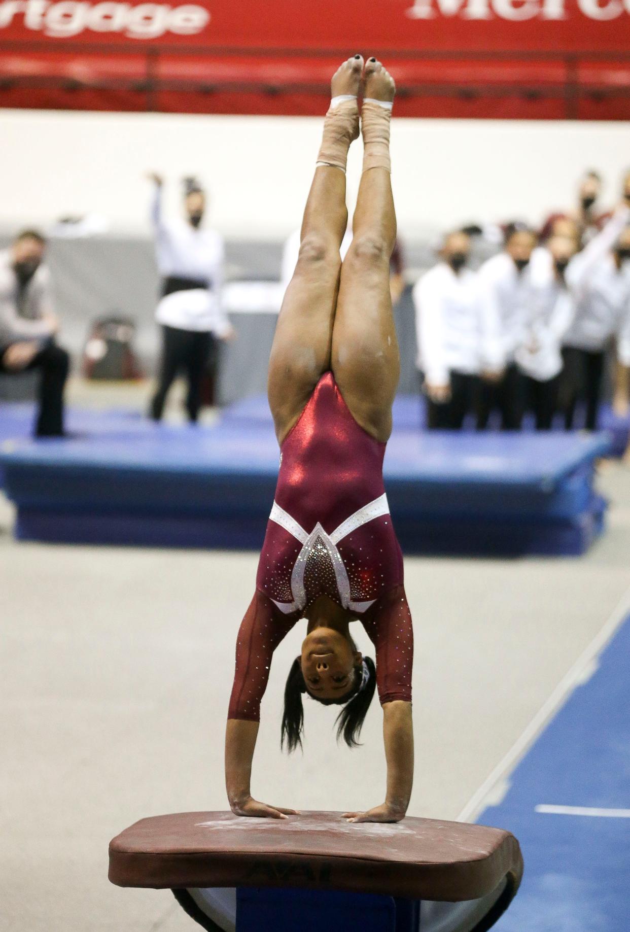 Shania Adams vaults as the Crimson Tide hosted Florida in Coleman Coliseum Stadium Friday, March 5, 2021. [Staff Photo/Gary Cosby Jr.]