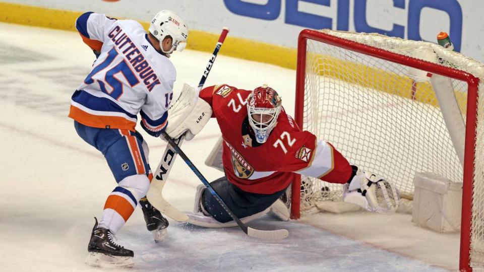 Florida Panthers goaltender Sergei Bobrovsky (72) stops a shot at the goal by New York Islanders right wing Cal Clutterbuck (15) in the first period at the FLA Live Arena in Sunrise on Saturday, October 16, 2021.