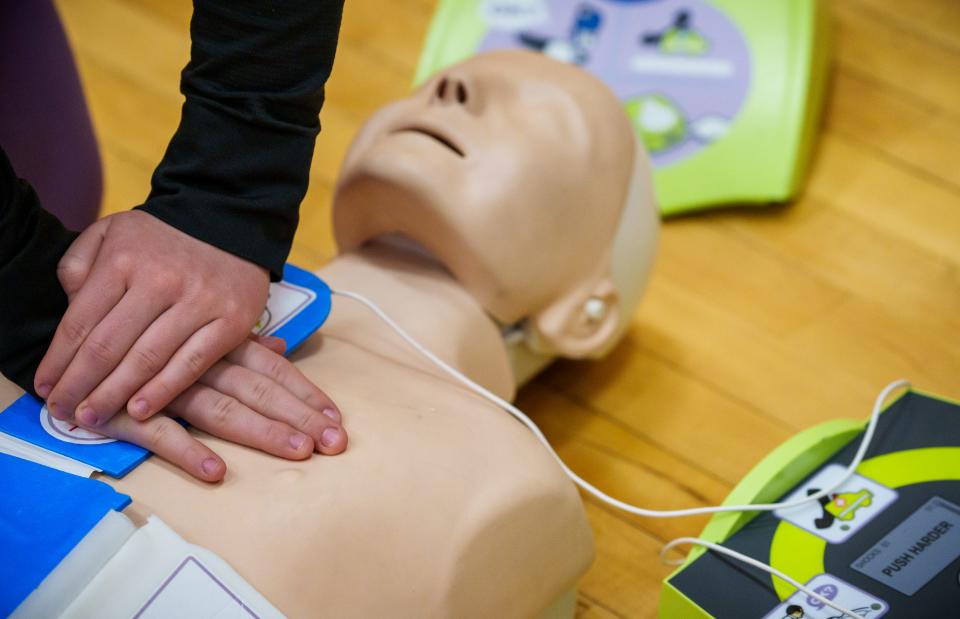 "The farmers market this past summer was giving out Narcan," Ruth Federle, a student at Columbus East, said as she participates in a CPR and AED exercise. "Since then, I like the idea of being prepared. I babysit a lot, so I'm glad I know how to do this now, too."