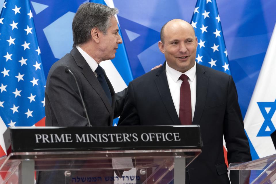 U.S. Secretary of State Antony Blinken, left, meets with Israel's Prime Minister Naftali Bennett, at the Prime Minister's Office, Sunday, March 27, 2022, in Jerusalem. (AP Photo/Jacquelyn Martin, Pool)