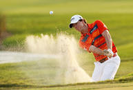 PALM BEACH GARDENS, FL - MARCH 03: Rory McIlroy of Northern Ireland hits out of the bunker on the 18th hole during the third round of the Honda Classic at PGA National on March 3, 2012 in Palm Beach Gardens, Florida. (Photo by Mike Ehrmann/Getty Images)