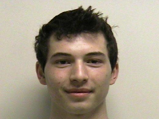 In this undated photo provided by the Utah County Sheriff's Department shows Benjamin Rutkowski, 19, of Orem, who was booked Saturday into the county jail for investigation of misdemeanor reckless endangerment. A Forest Service law enforcement officer with military experience discovered trip wires for booby traps at entrances of a crude shelter made of dead tree limbs in Provo Canyon, said Utah County Sheriff's Dept. Sgt. Spencer Cannon. (AP Photo/Utah County Sheriff Department)