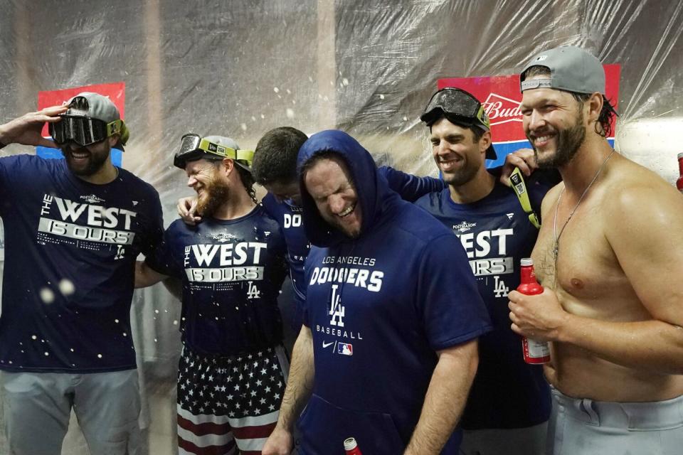 Dodgers' Joey Gallo, Craig Kimbrel, Max Muncy, Chris Taylor and Clayton Kershaw celebrate in the locker room