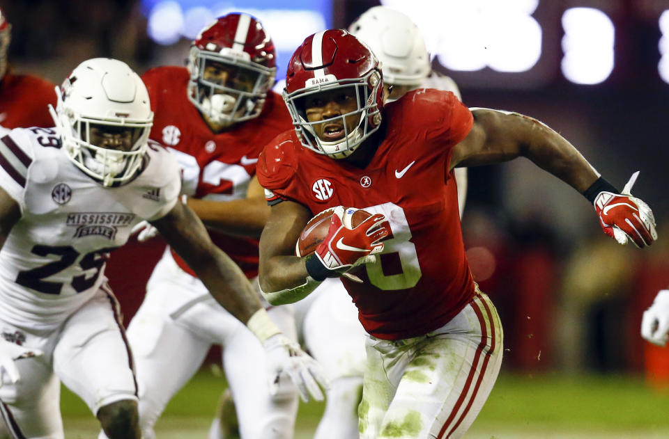 Alabama running back Josh Jacobs (8) carries the ball during the second half of an NCAA college football game against Mississippi State, Saturday, Nov. 10, 2018, in Tuscaloosa, Ala. Alabama won 24-0. (AP Photo/Butch Dill)