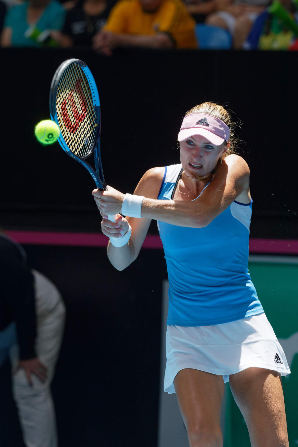 France's Kristina Mladenovicin returns a shot against Australia's Ash Barty in their Fed Cup tennis final in Perth, Australia, Sunday, Nov. 10, 2019. (AP Photo/Trevor Collens)