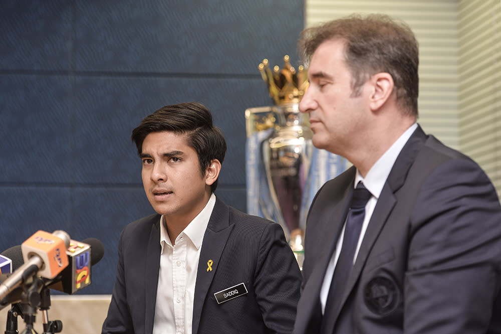 Youth and Sports Minister Syed Saddiq Abdul Rahman speaks during a press conference after a meeting with the top management of Manchester City in Putrajaya May 23, 2019. — Picture by Miera Zulyana