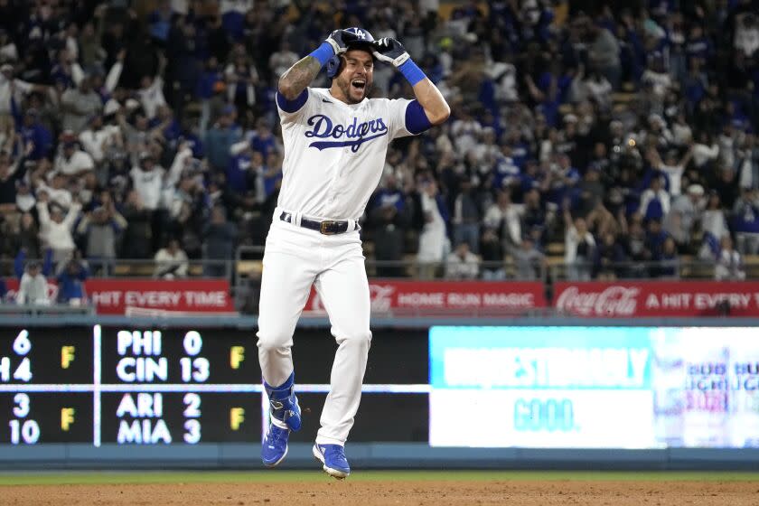 Los Angeles Dodgers' David Peralta celebrates after hitting a two run walk-off single.