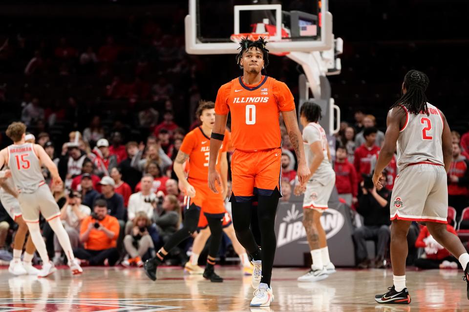 Feb 1, 2024; Columbus, Ohio, USA; Illinois Fighting Illini guard Terrence Shannon Jr. (0) reacts to a field goal during the second half of the NCAA men’s basketball game against the Ohio State Buckeyes at Value City Arena. Ohio State lost 87-75.