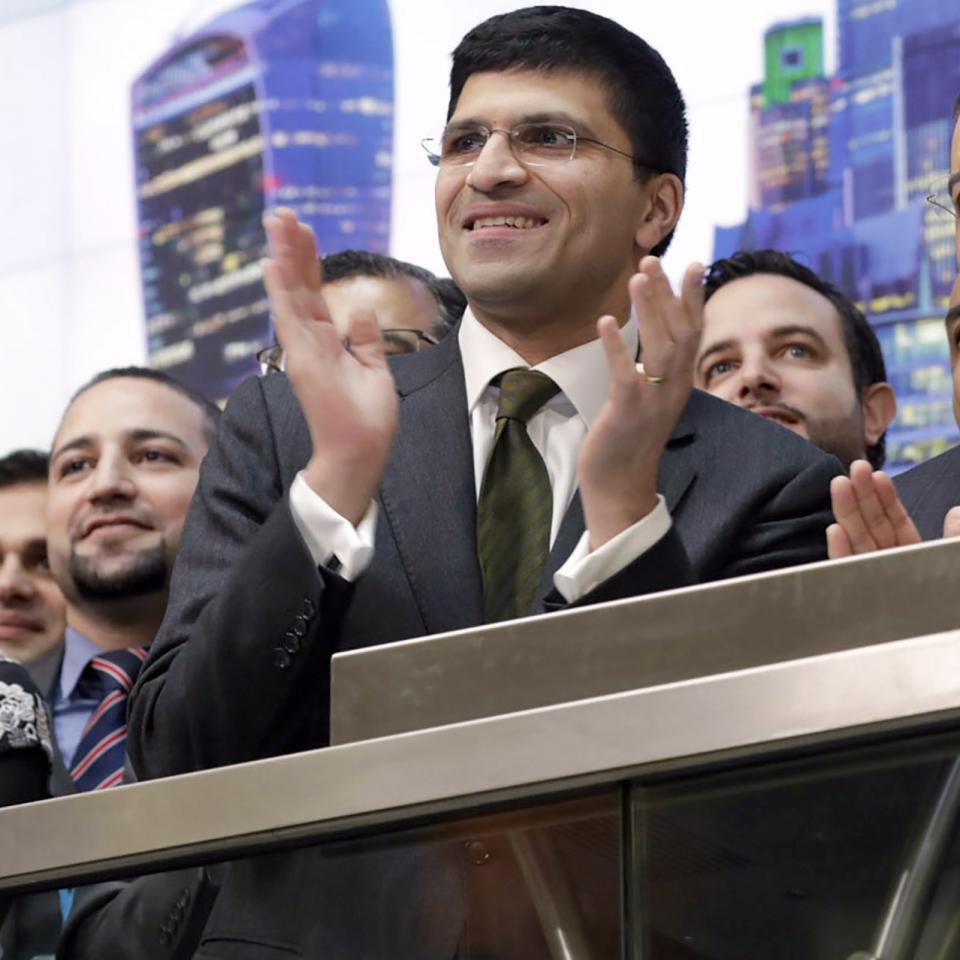 Nikhil Rathi clapping and smiling