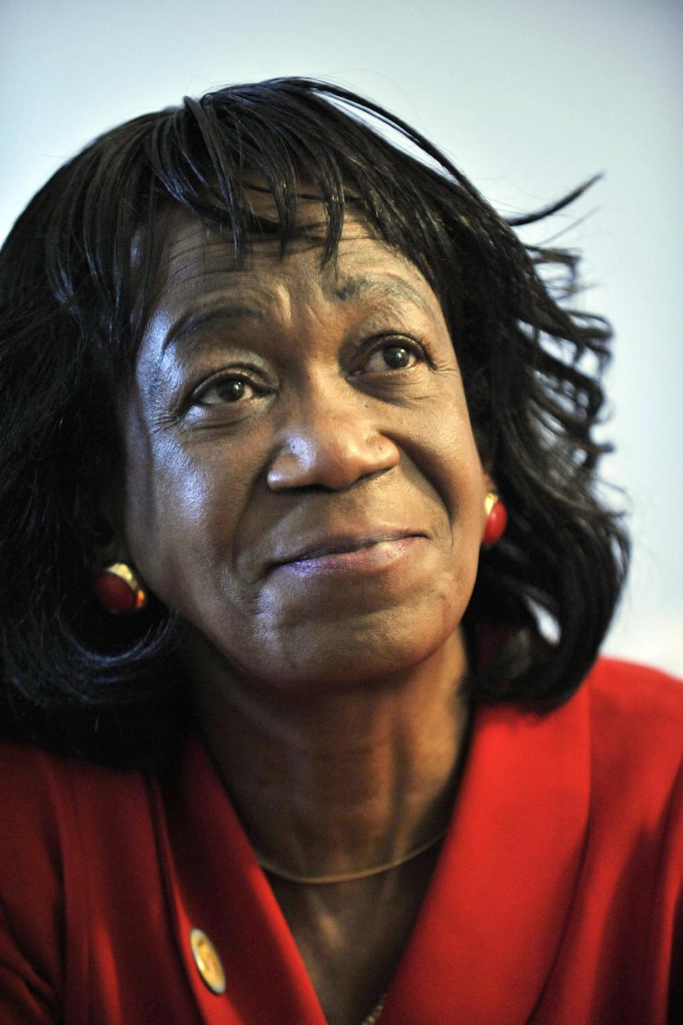 FILE - In this Tuesday, Nov. 24, 2009, file photo, President Barack Obama's aunt Zeituni Onyango speaks to The Associated Press during an interview in her home in Boston. Onyango, whose status as an illegal immigrant was revealed days before Obama was elected in 2008, died Tuesday, April 8, 2014, said Cleveland attorney Margaret Wong, who represented Onyango in her immigration case. She was 61. Wong said she was being treated for cancer and respiratory problems. (AP Photo/Josh Reynolds, File)