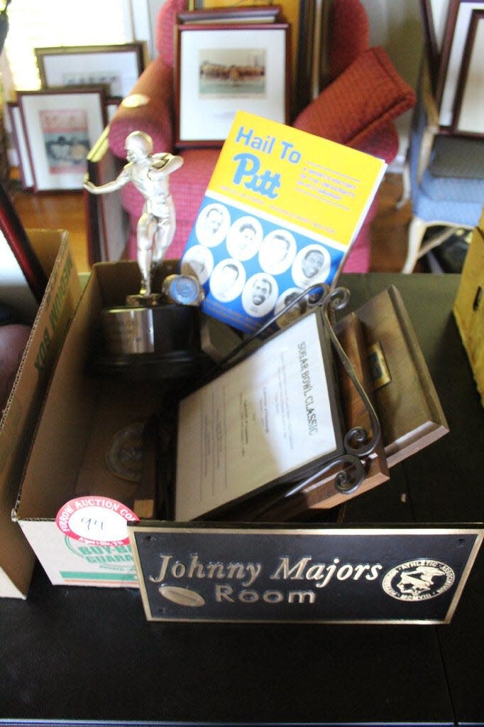 Here are sports memorabilia and personal items belonging  to Johnny Majors, the iconic coach for Tennessee and Pittsburgh. They are available in an estate auction.