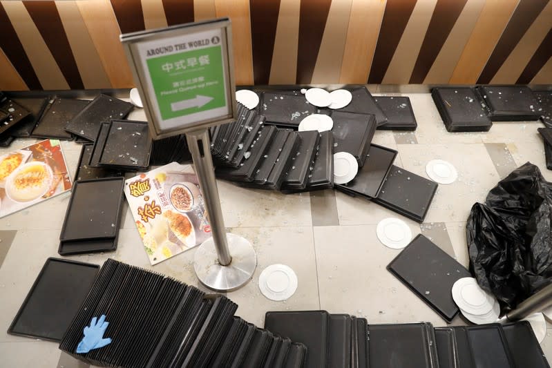 Scattered trays are seen at a cafeteria in Hong Kong Polytechnic University (PolyU) in Hong Kong