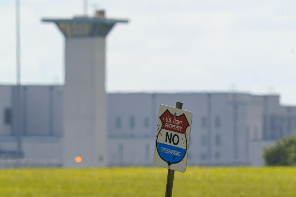 A No Trespassing sign stands in front the federal prison complex in Terre Haute, Ind., Wednesday, Aug. 26, 2020. A judge in Washington is halting for now the government’s planned Friday execution at the federal prison in Terre Haute, Indiana of Keith Dwayne Nelson who was convicted of kidnapping, raping and murdering at 10-year-old Kansas girl. (AP Photo/Michael Conroy, File)