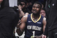 New Orleans Pelicans' Zion Williamson argues his second foul call from the bench during the first half of an NBA basketball game against the Brooklyn Nets, Tuesday, March 19, 2024, in New York. (AP Photo/Bebeto Matthews)