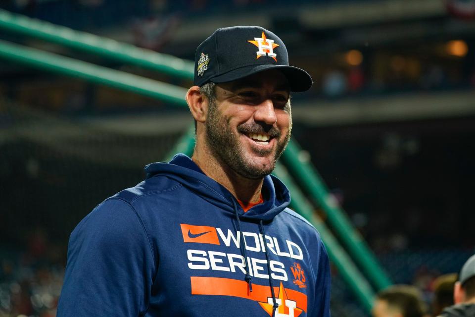 Justin Verlander smiles before Game 3 of the World Series between the Houston Astros and Philadelphia Phillies on Tuesday, Nov. 1, 2022, in Philadelphia. (AP Photo/Chris Szagola)