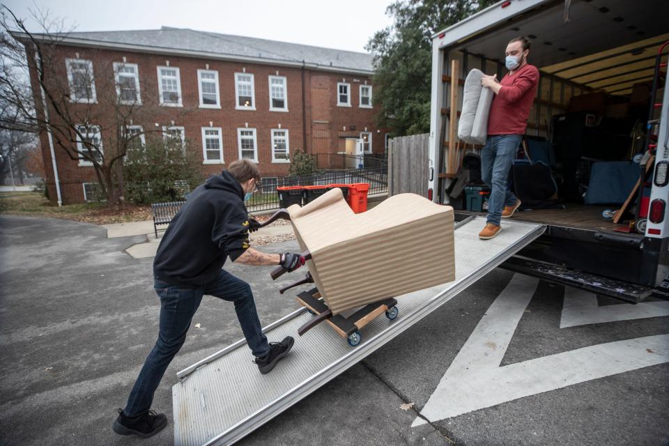 Kay Barringer's company helps the elderly move from their homes to assisted living. Andrew Miller, left, and Cody LeGrande move Estrella Langub's furniture to her new apartment at the Masonic Home. Jan 14, 2022