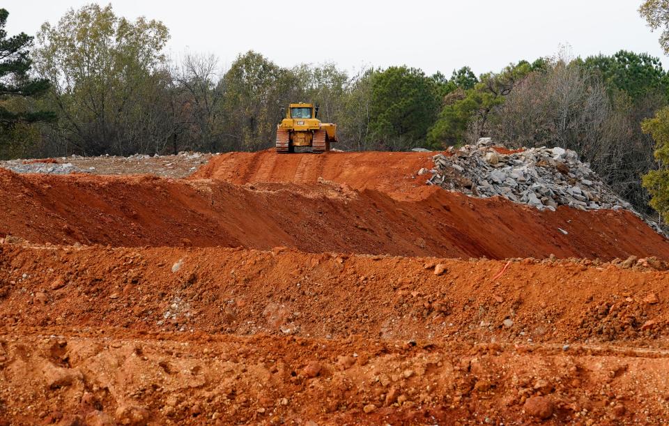 A bulldozer moves dirt on a project in Kentuck Park in Northport Thursday, Nov. 30, 2023.