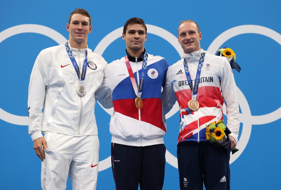 Luke Greenbank (right) won bronze before Ryan Murphy (left) questioned the sport’s integrity (Getty)