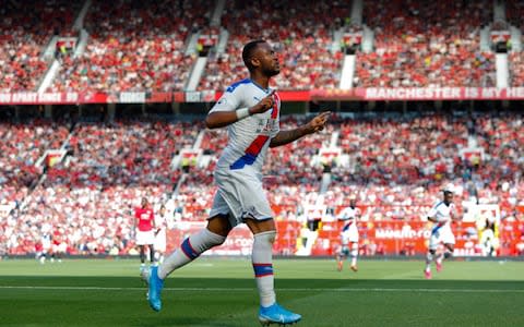 Jordan Ayew celebrates after scoring his side's first goal - Credit: AP