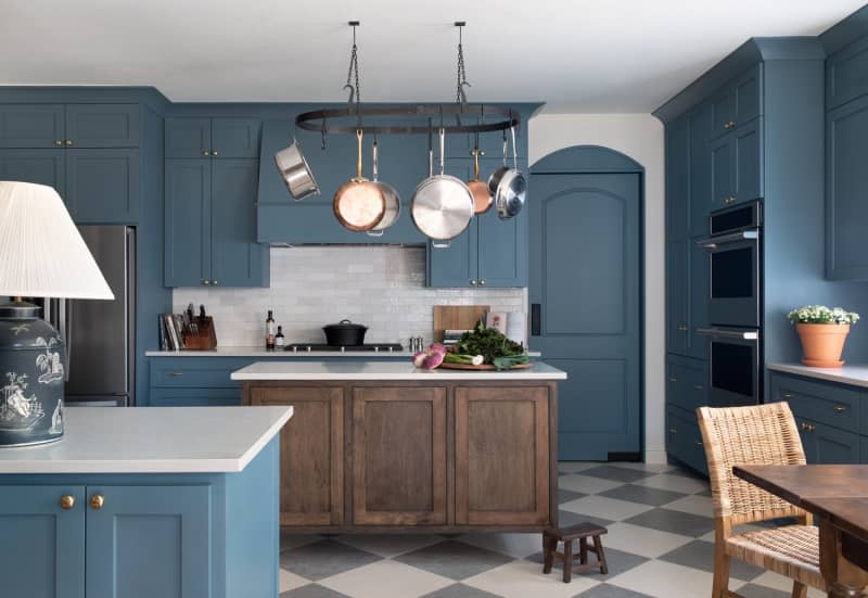 Kitchen with blue cabinets and doors