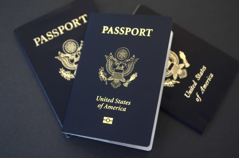 In this May 9, 2017, file photo, U.S. passports lie on a table in Dallas. Starting Jan. 22, 2018, pa