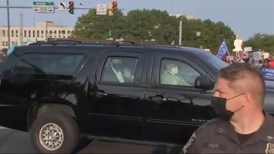 President Trump waves to the crowd outside of Walter Reed Medical Center on Oct. 4, 2020