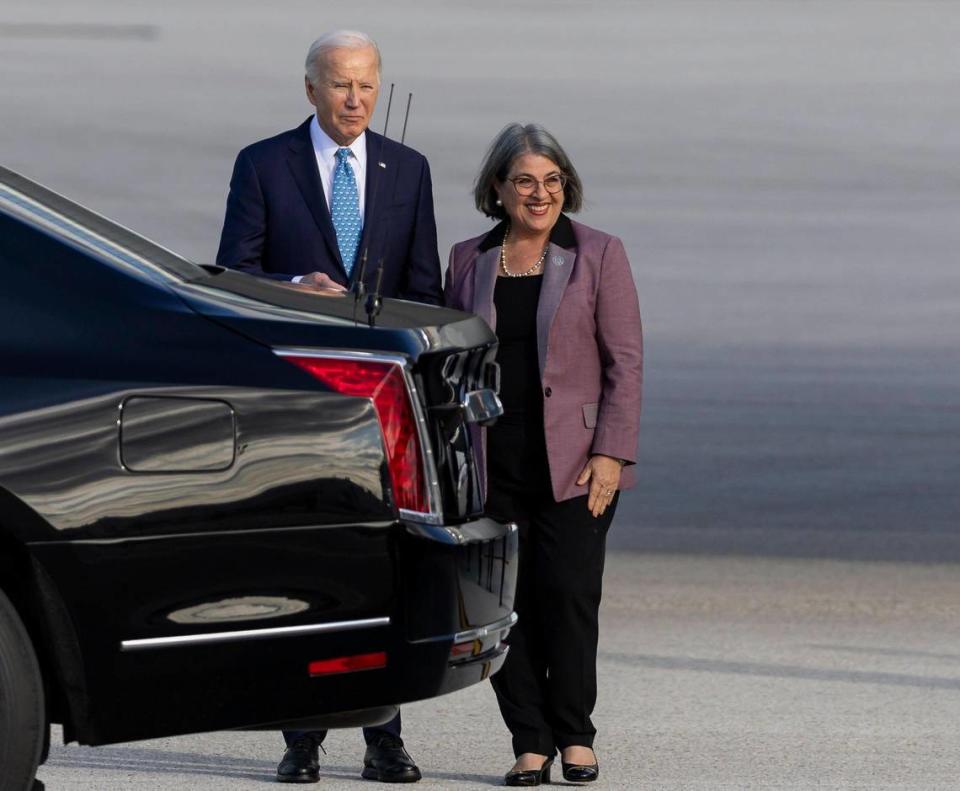 President Joe Biden greets Miami-Dade Mayor Daniella Levine Cava at Miami International Airport on Tuesday.