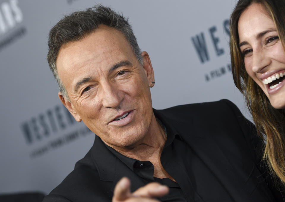 Singer-songwriter Bruce Springsteen, left, and daughter Jessica Springsteen arrive at the special screening of "Western Stars" at Metrograph on Wednesday, Oct. 16, 2019, in New York. (Photo by Evan Agostini/Invision/AP)