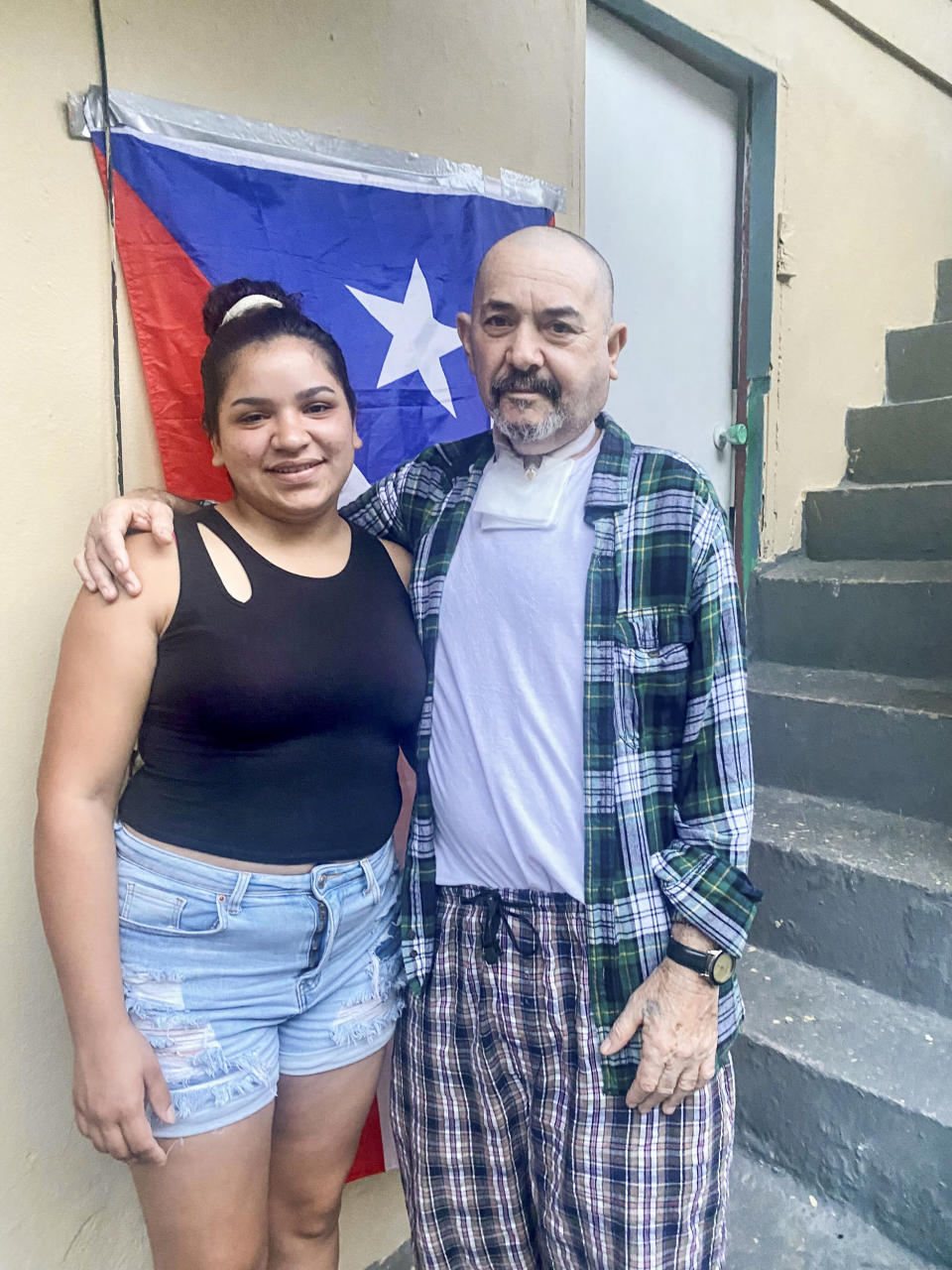 Image: Luis De Jesús Ramos, 63, and his daughter Ashly Perez, 26, in their home in Jayuya, Puerto Rico. (Daniella Silva / NBC News)