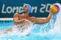 LONDON, ENGLAND - AUGUST 12: Valentino Gallo of Italy passes the ball during the Men's Water Polo Gold Medal match between Croatia and Italy on Day 16 of the London 2012 Olympic Games at the Water Polo Arena on August 12, 2012 in London, England. (Photo by Clive Rose/Getty Images)