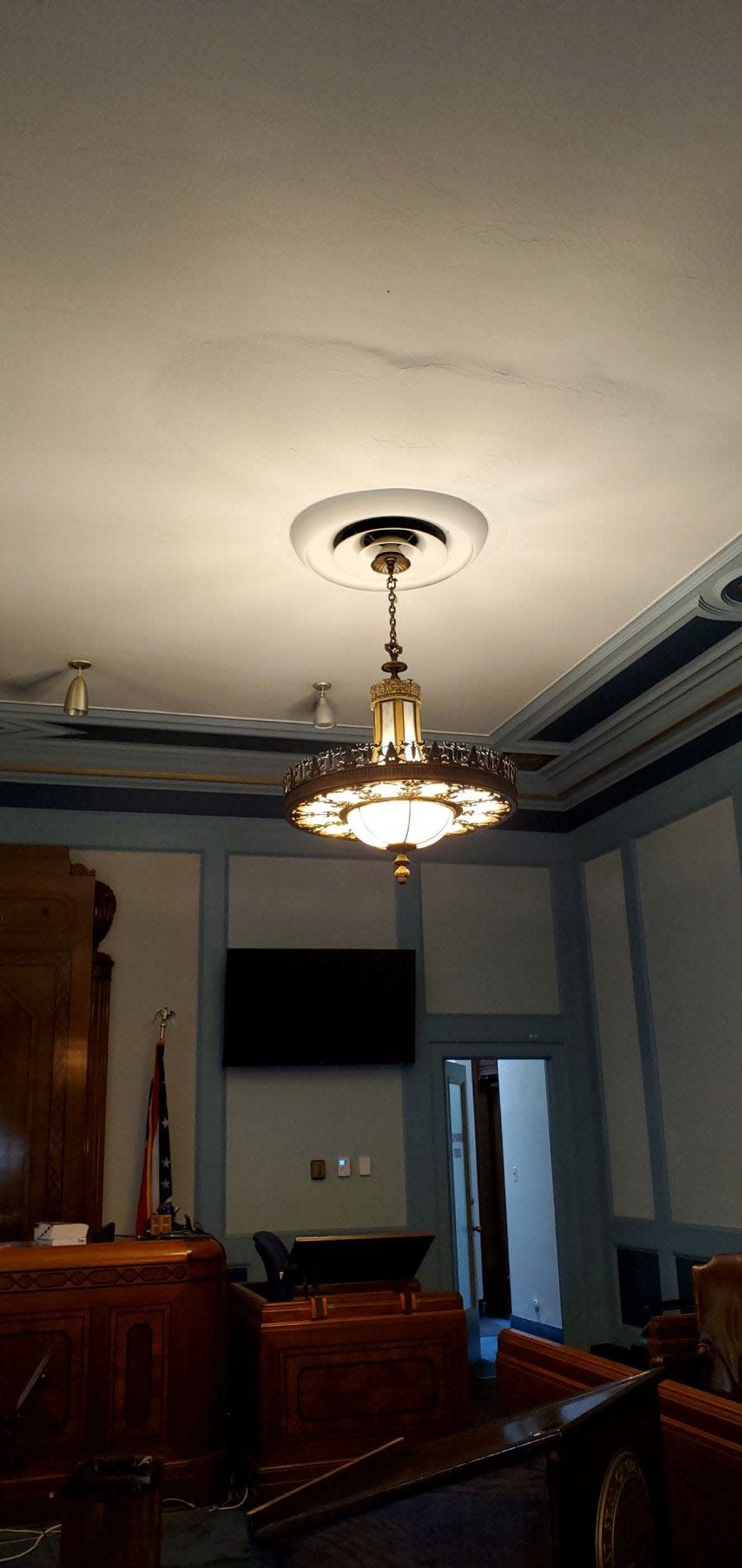 The cost for clearing benches, putting benches back in and completing the Ashland County Common Pleas courtroom ceiling will be about $230,000.