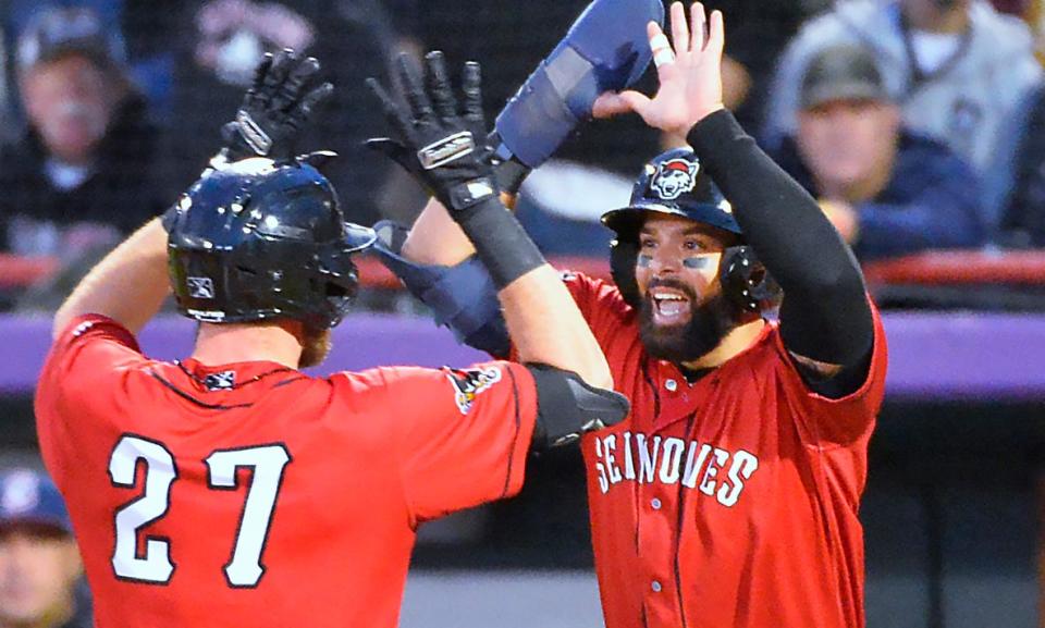 Erie SeaWolves Gage Workman, left, and Michael De La Cruz celebrate Workman's fifth-inning home run Saturday night at UPMC Park during Game 1 of the Eastern League Championship Series against Somerset.