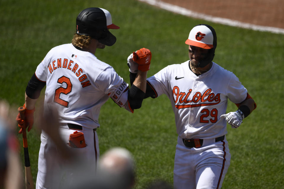 Baltimore Orioles' Ramon Urias (29) celebrates after his home run with Gunnar Henderson (2) during the fourth inning of a baseball game against the Oakland Athletics, Sunday, April 28, 2024, in Baltimore. (AP Photo/Nick Wass)
