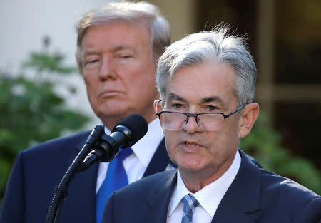 FILE PHOTO: U.S. President Donald Trump looks on as Jerome Powell, his nominee to become chairman of the U.S. Federal Reserve, speaks at the White House in Washington, U.S., November 2, 2017. REUTERS/Carlos Barria