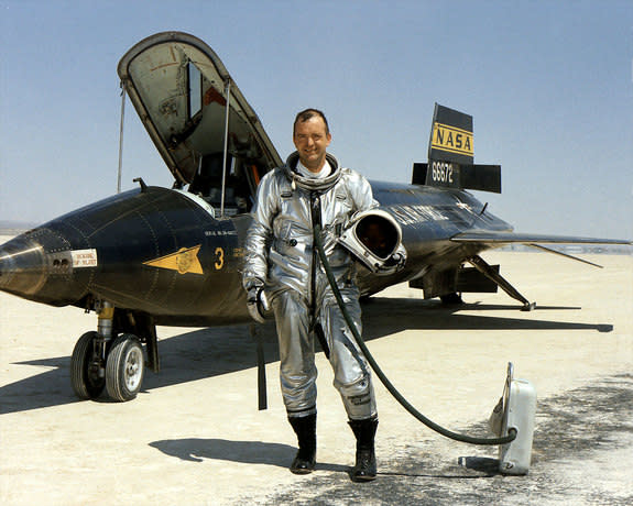 NASA research pilot William "Bill" Dana is seen standing next to the X-15 rocket-powered aircraft after a flight in 1967. Dana died on May 6, 2014 at the age of 83.