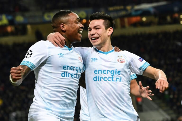 PSV's Hirving Lozano (right) celebrates with Steven Bergwijn after opening the scoring against Inter