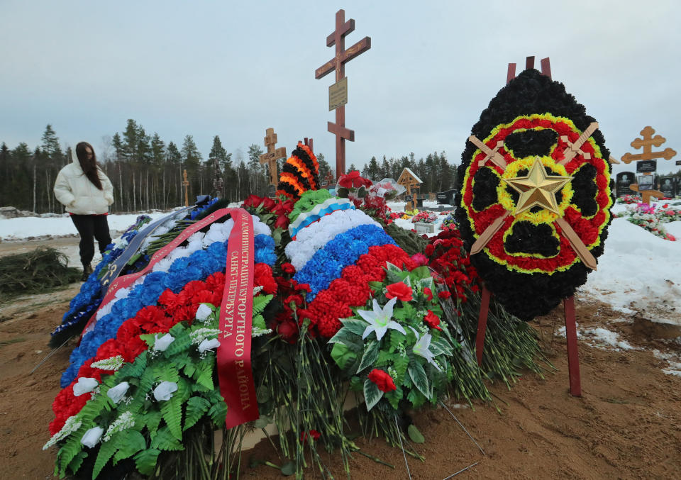 A view shows the grave of Dmitry Menshikov, a mercenary for the private Russian military company Wagner Group, killed during the military conflict in Ukraine, in the Alley of Heroes at a cemetery in Saint Petersburg, Russia December 24, 2022. REUTERS/Igor Russak