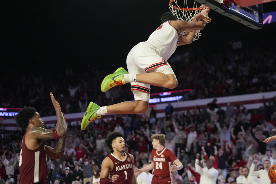 Georgia guard RJ Melendez (15) scores in the second half of an NCAA college basketball game against Alabama Wednesday, Jan. 31, 2024, in Athens, Ga. (AP Photo/John Bazemore)