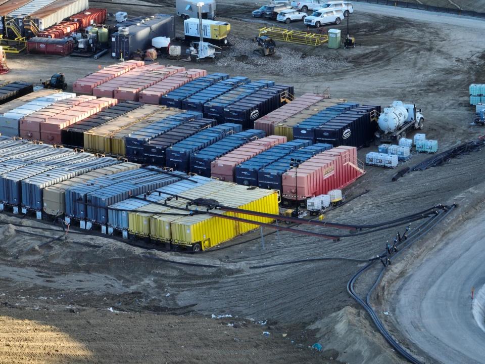 Metal storage containers are connected with pipes at Chiquita Canyon Landfill in Castaic.