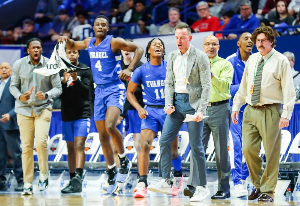 Evangel Christian's reserves run out on the court during a timeout as they take the lead on Butler County on Thursday at the 2024 UK Healthcare KHSAA Boys' Sweet 16 in Lexington.